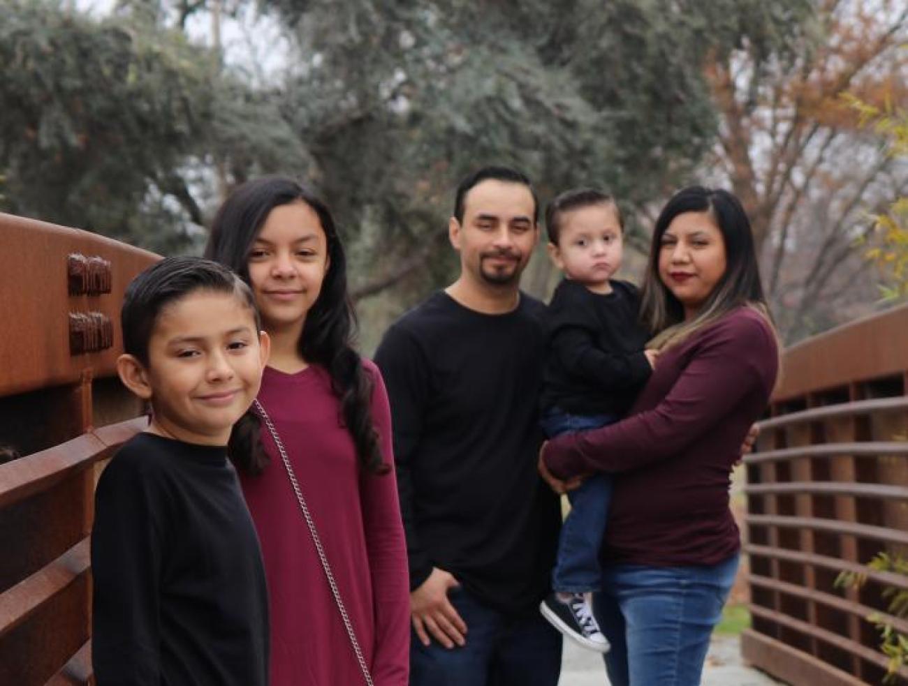 Stacy Bravo and family cropped.jpg